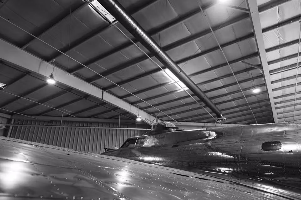 Airplane hangar with large door