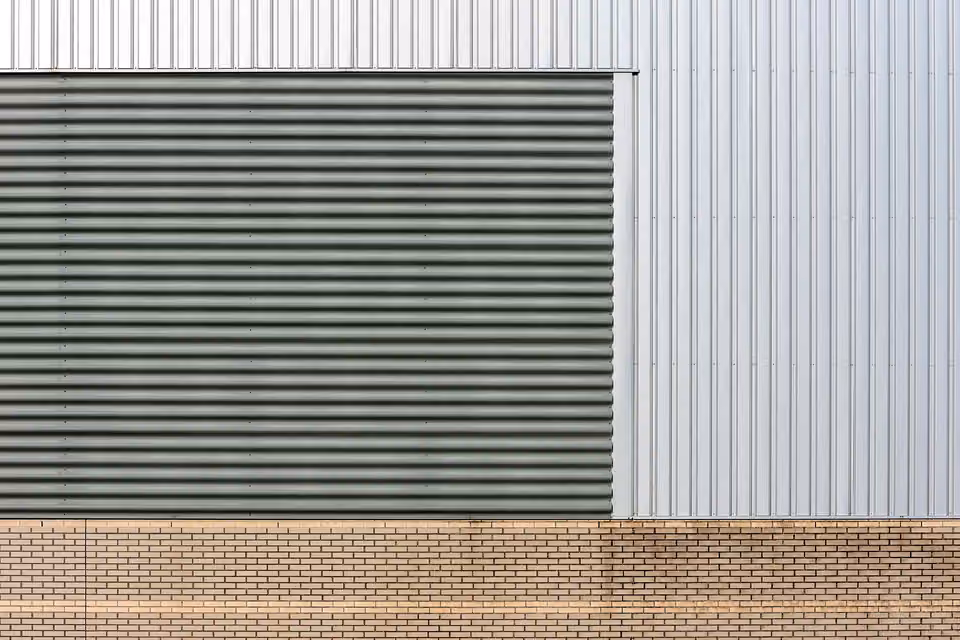 Insulated steel garage door on modern building