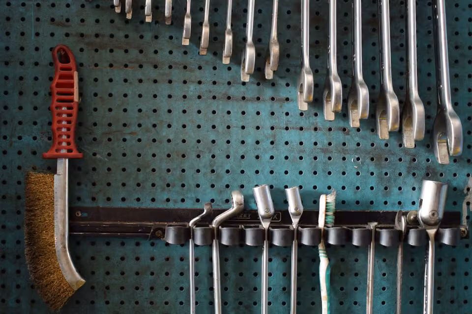 Standard hardware tools on a pegboard